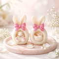 Osterkerzen- Hase mit einer rosa Schleife - im 2er Set